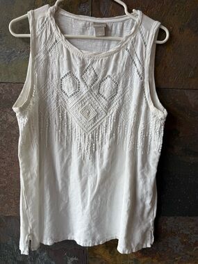 Chico’s decorative sleeveless top. Sz2/12. White beaded embroidery, cut outs.